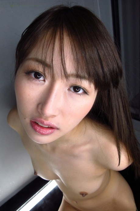 Japanese teen is masturbated with a sex toy after sucking cock on her knees 80337902