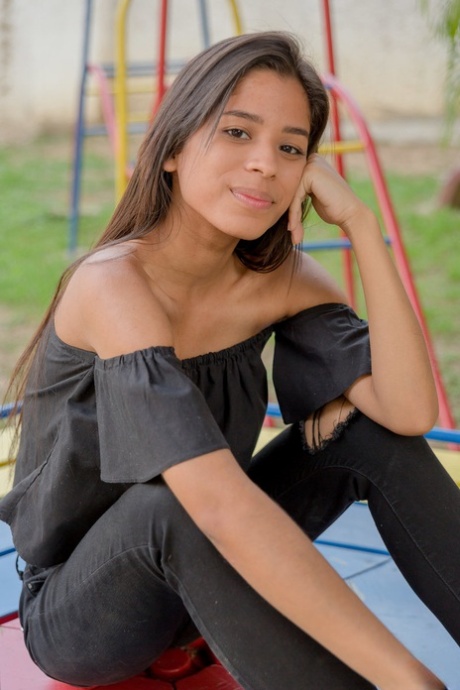 Smiley hot glamour girl Karin Torres looking sexy in ripped jeans on a swing 76858885