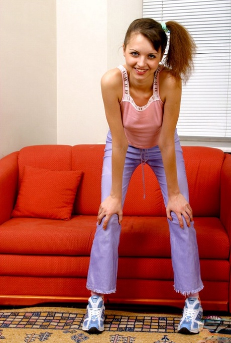 Teen amateur Nataly touches her breasts and trimmed muff in sock and joggers 26830383