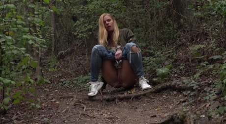 Blonde girl Chrissy Fox gets caught taking a piss while out in the woods 30416807