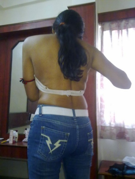Indian MILF displays her natural tits while wearing blue jeans 21048626