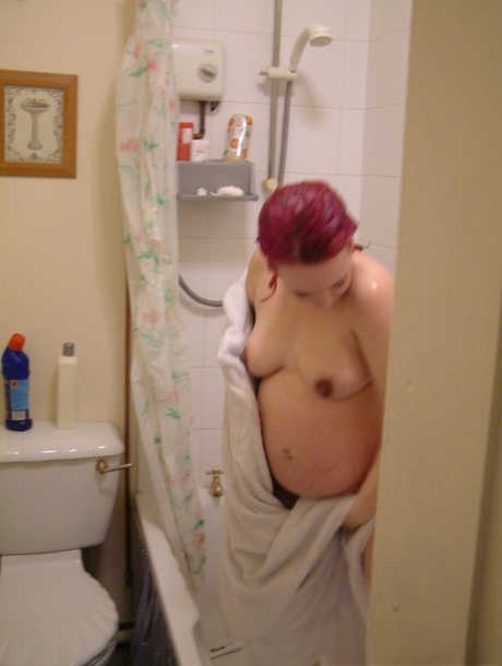 Pregnant redhead takes a shower while being secretly recorded on spy cam 60455974