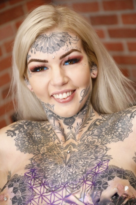 Blonde girl Amber Luke toys her twat after getting a new tattoo in a studio 60683662
