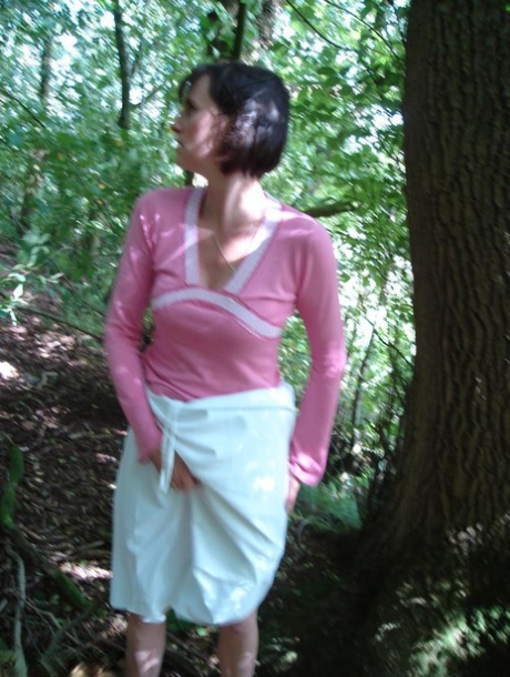 Older woman Slut Scot Susan gives a blowjob in the woods after baring her ass 49239463