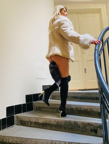 Hot blonde Katerina Hartlova masturbates on a flight of stairs in OTK boots 43865272
