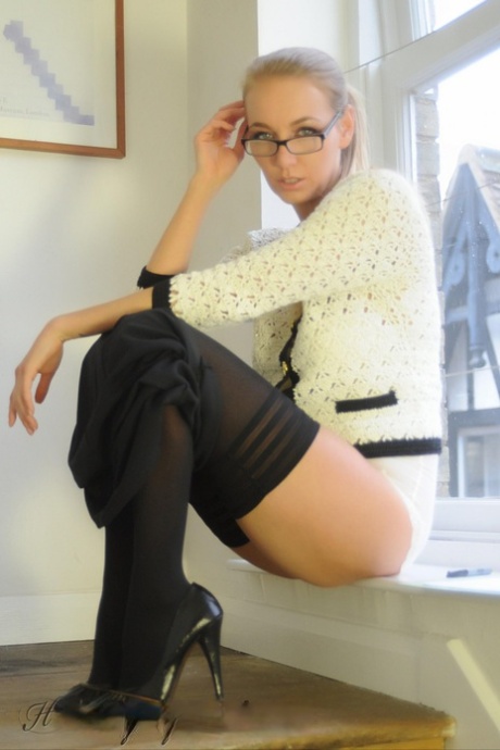 Hot UK blonde Hayley Marie Coppin lets her hair down in a girdle and stockings 32806333