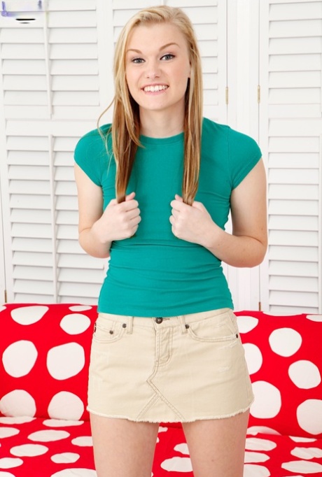 Cute blonde teen Cassidy Ryan pulls of skirt and panties for nude spread 58995023